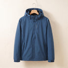 Blue waterproof jacket with hood on a hanger