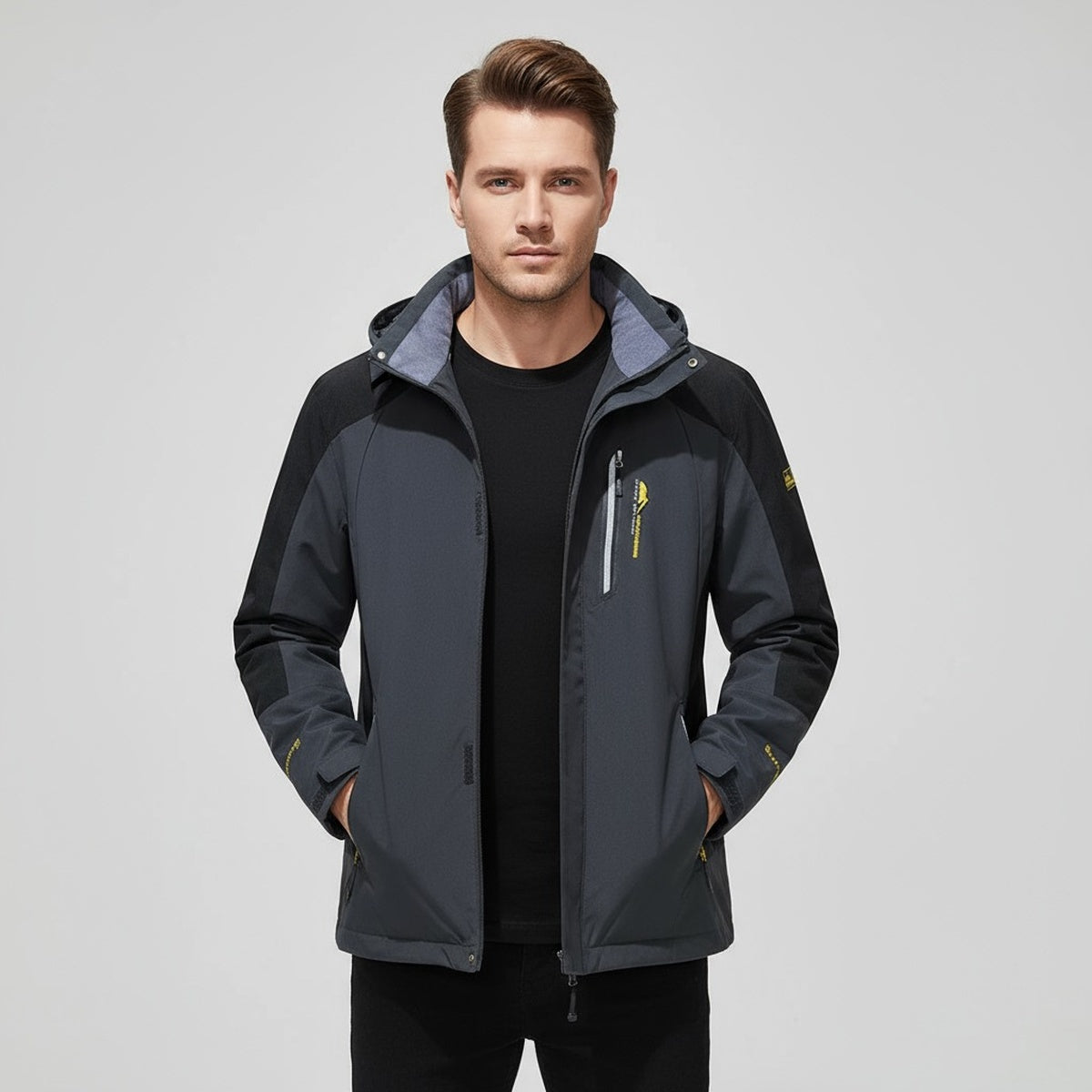 Man wearing the dark grey waterproof hiking jacket
