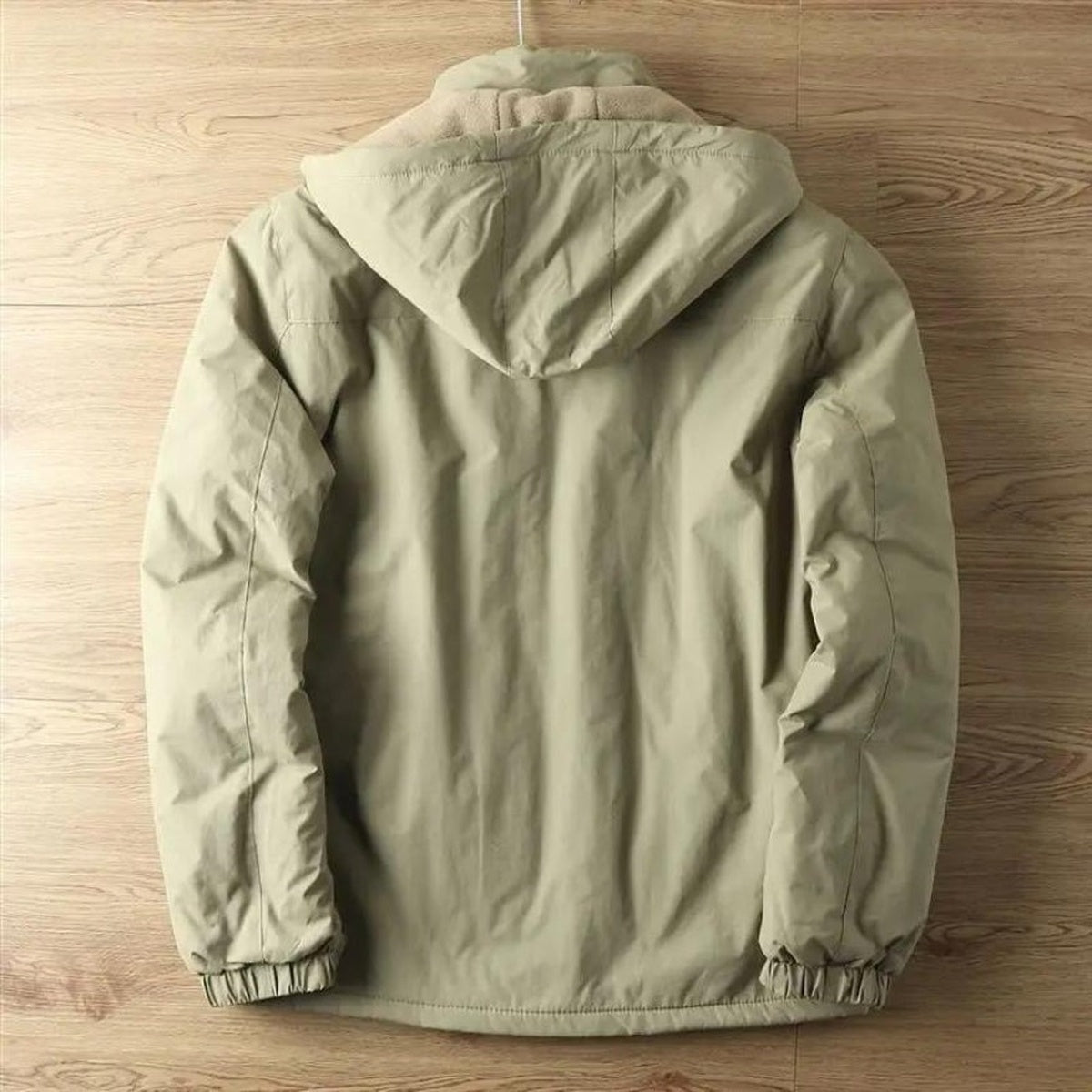 Khaki winter jacket with hood, back view