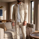 Man wearing beige waffle-texture zip jacket and matching trousers indoors | Chaps London