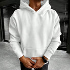 White plain hoodie with kangaroo pocket worn by a man | Chaps London