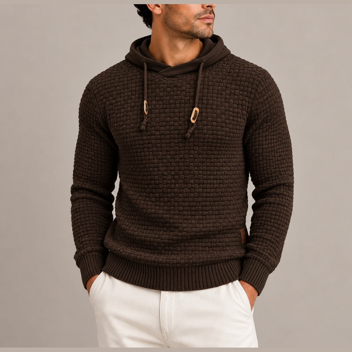 Man wearing brown basket weave knit hoodie with wooden toggle drawstrings | Chaps London