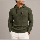 Man wearing olive green basket weave knit hoodie with wooden toggles | Chaps London