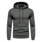 Dark gray drawstring hoodie with kangaroo pocket, worn by a person | Chaps London