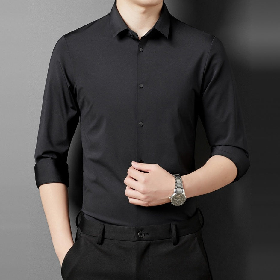 Black point collar shirt with rolled sleeves worn by a man | Chaps London