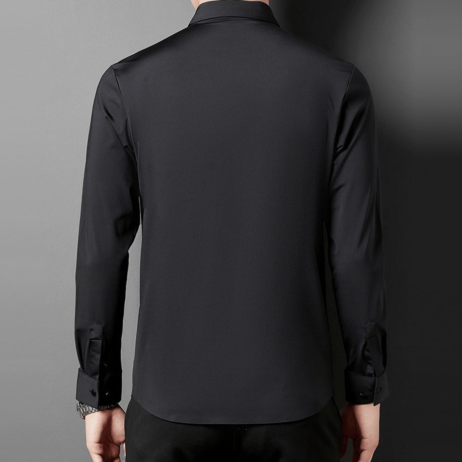Black long sleeve point collar shirt worn by man, back view | Chaps London