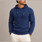 Navy blue basket weave knit hoodie worn by man with drawstrings | Chaps London