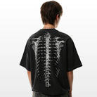 Worn black oversized t-shirt with spine skeleton print on back | Chaps London