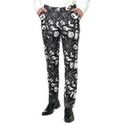 Black trousers with white Halloween ghost and skeleton print, worn by model | Chaps London