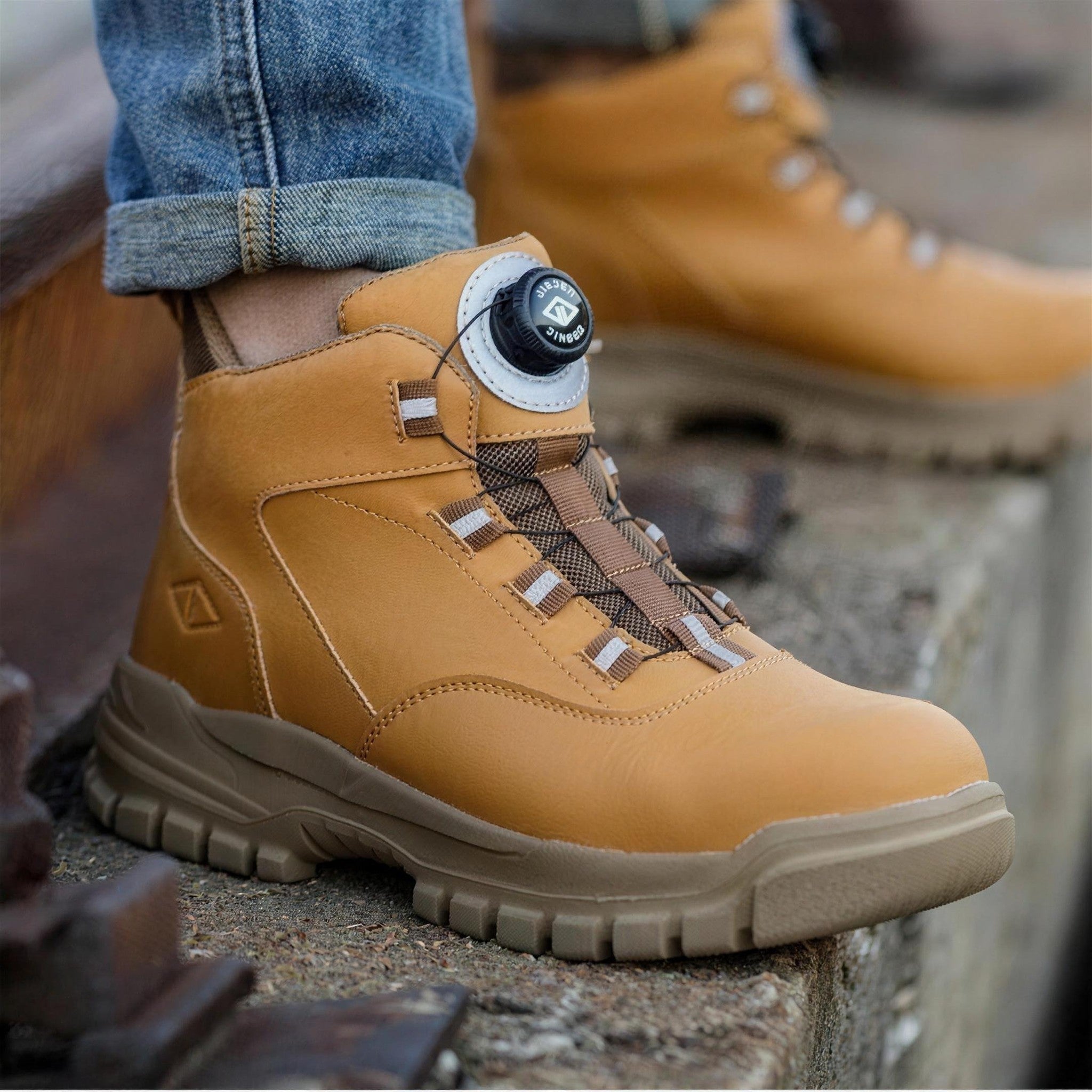 Tan ankle boot with dial lacing system worn on foot outdoors | Chaps London