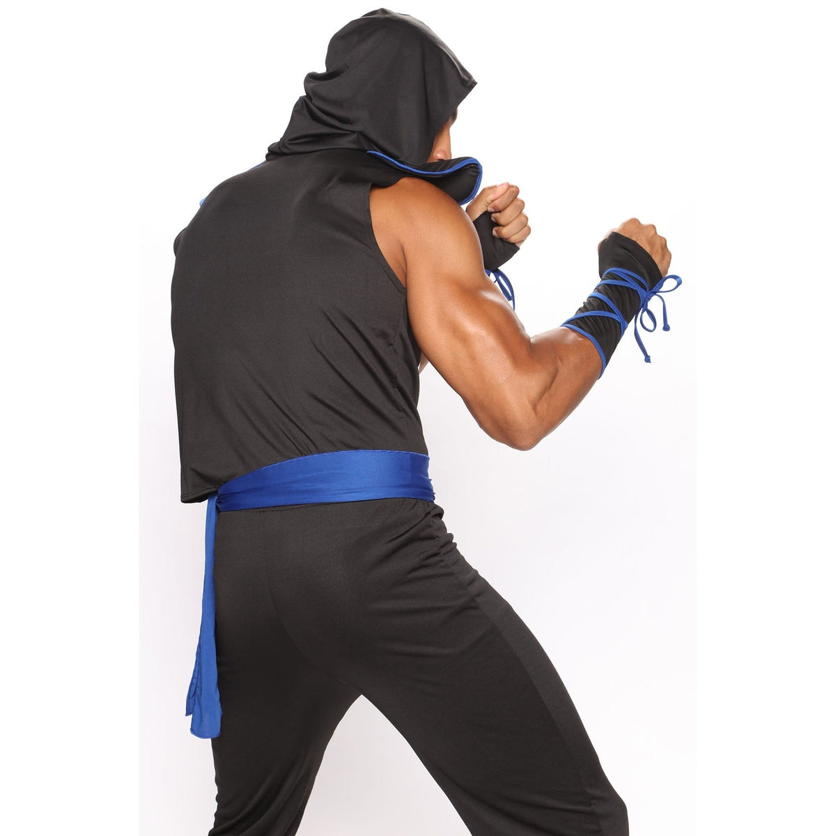 Man wearing black ninja costume with blue sash and gauntlets, fighting stance | Chaps London