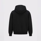 Black oversized hoodie, back view, striped hood trim detail, worn by model | Chaps London