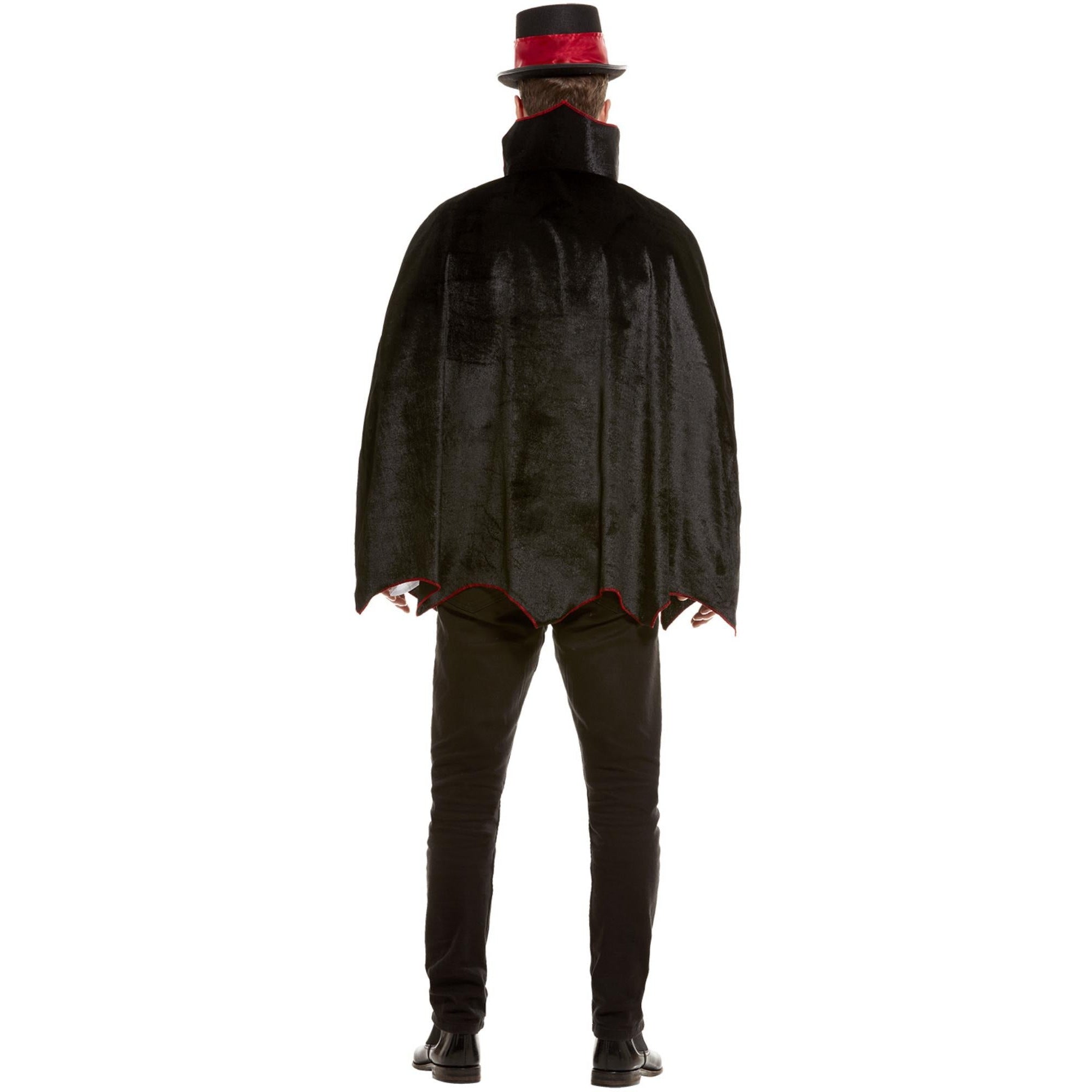 Man wearing black cape costume with red top hat, back view | Chaps London