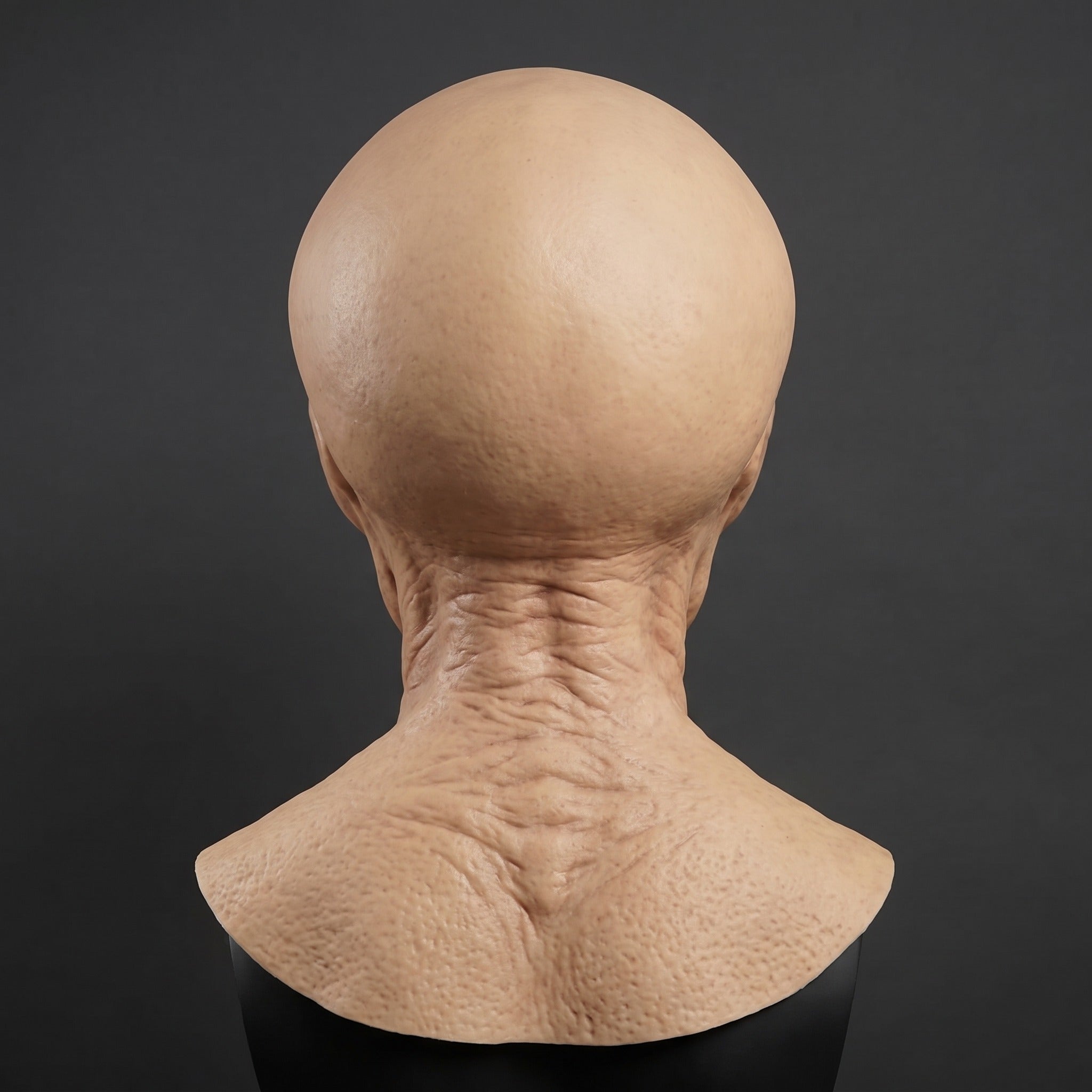 Bald textured mask with neck piece, shown on mannequin from behind | Chaps London