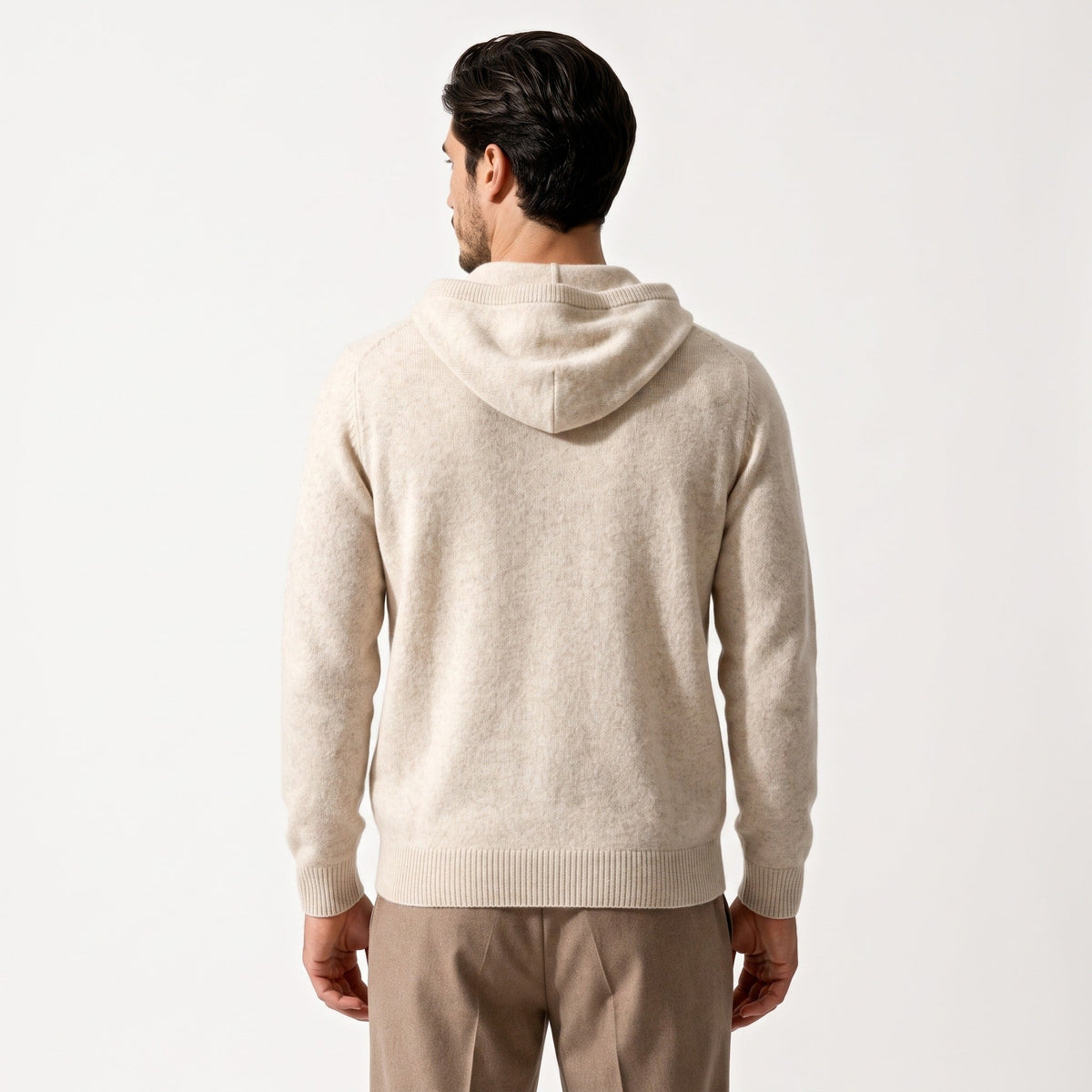 Man wearing beige knit hooded sweater, back view, with brown trousers | Chaps London
