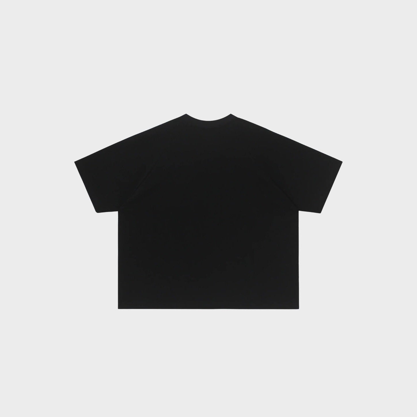 Black oversized t-shirt shown flat, plain back view, no visible print | Chaps London