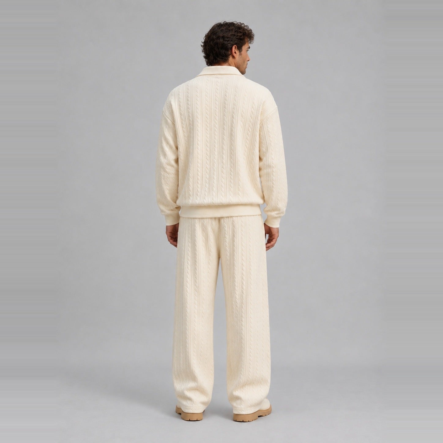 Man wearing cream cable-textured collared top and matching wide trousers, back view | Chaps London