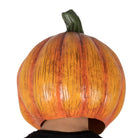 Orange pumpkin head mask with green stem worn by a person | Chaps London