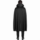 Man wearing black high-collar cape costume, viewed from behind, standing | Chaps London