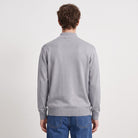 Man wearing grey half-zip jumper and blue jeans, back view | Chaps London