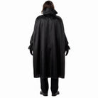 Man wearing black satin cape costume with tall collar, back view | Chaps London