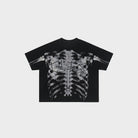Black oversized t-shirt with ribcage x-ray print, laid flat | Chaps London