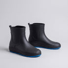 Black ankle wellies with blue soles, shown as a pair, no mannequin | Chaps London