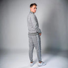 Man wearing grey check tracksuit with zip jacket and matching joggers | Chaps London
