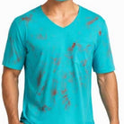 Teal V-neck shirt with bloody distressed pattern, worn by a man | Chaps London