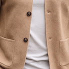 Tan textured knit cardigan with buttons and patch pockets, worn by person | Chaps London