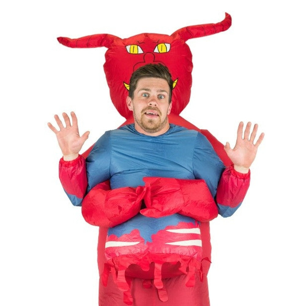 Man wearing red inflatable devil costume with horns, worn on body | Chaps London