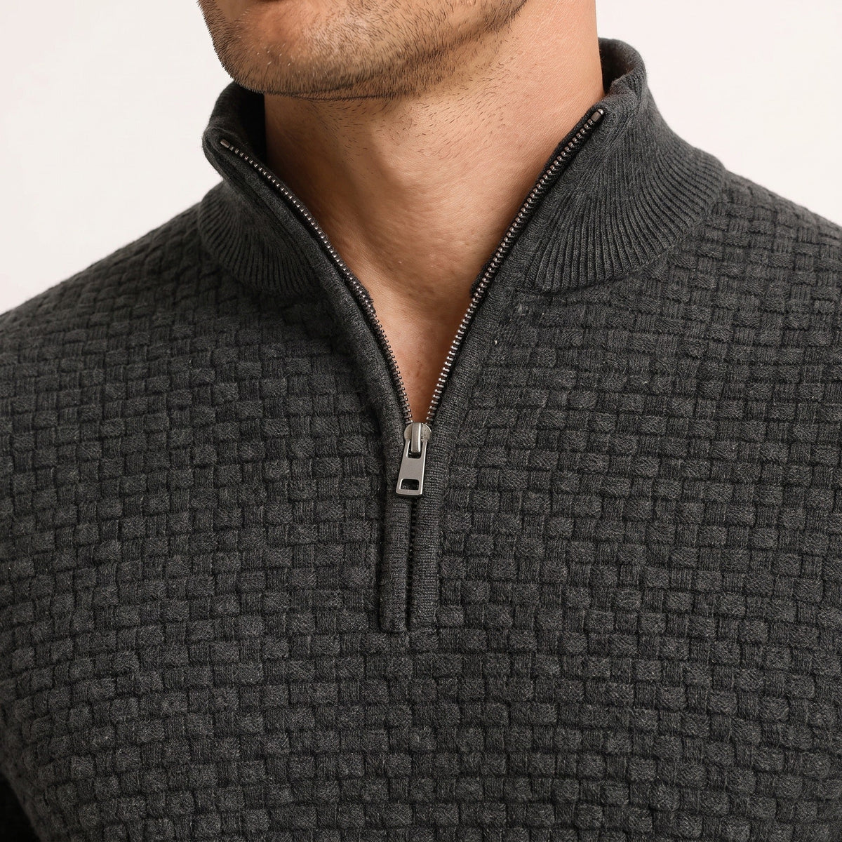 Man wearing dark grey waffle knit quarter zip mock neck sweater | Chaps London