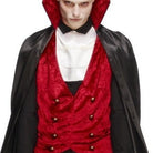 Man wearing red velvet waistcoat with black cape and white cravat | Chaps London