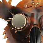 Close-up brown steampunk owl mask with spiked goggle eye, textured design | Chaps London