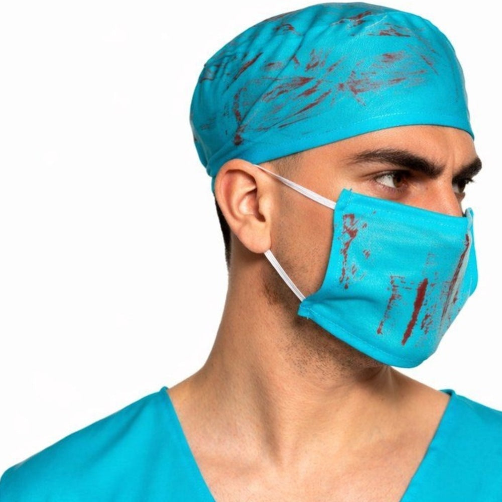 Man wearing teal blood-splattered surgical cap and face mask, zombie costume | Chaps London