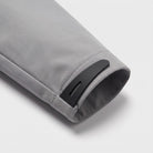 Gray jacket sleeve close-up showing cuff tab and adjustable strap detail | Chaps London