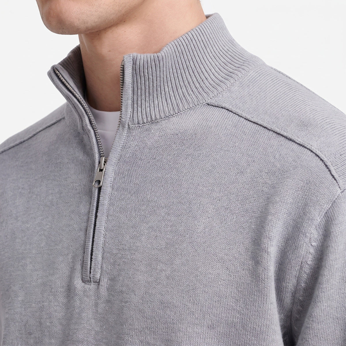 Grey wool blend half-zip jumper, close-up on man's neck and shoulder | Chaps London