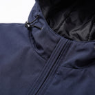 Close-up of navy jacket hood with drawstring toggle and zipper detail | Chaps London