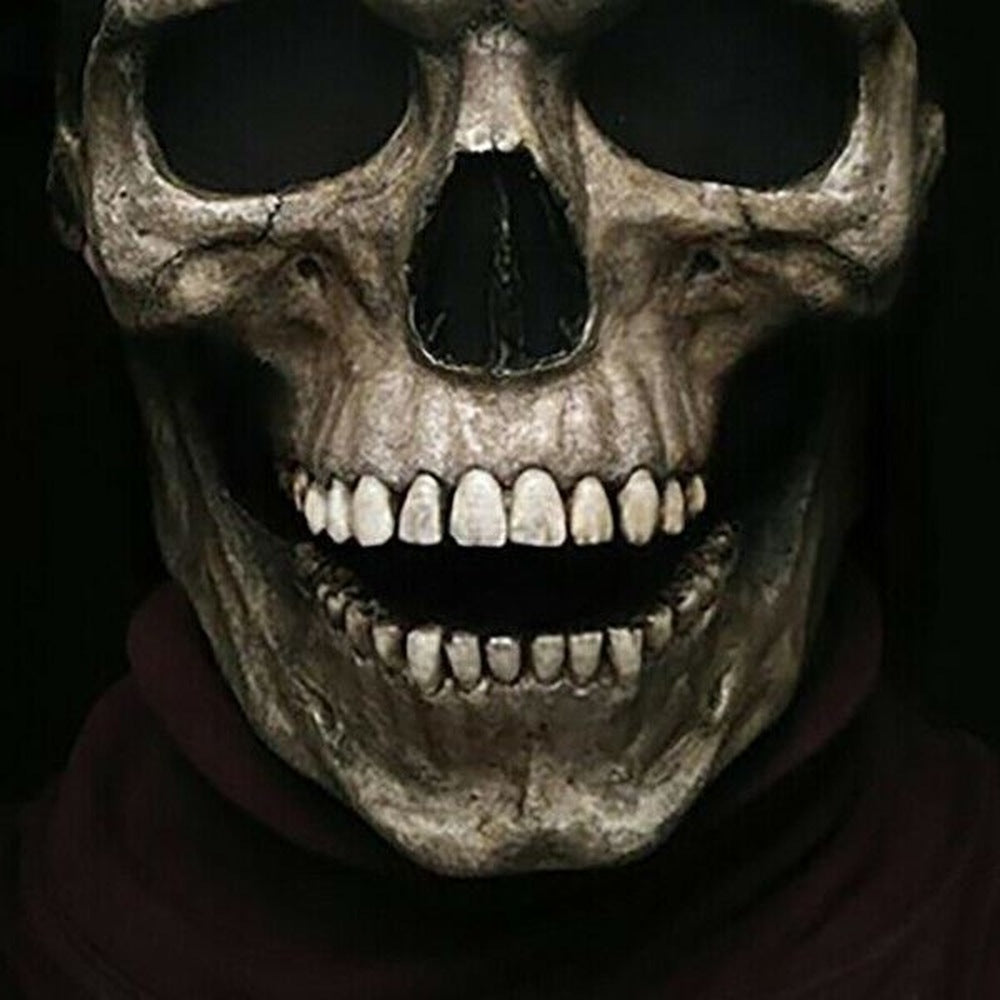 Grey skull mask with movable jaw worn by person, close-up front view | Chaps London