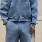 Blue zip-up hoodie and matching wide-leg joggers worn by person | Chaps London