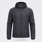 Black hooded windbreaker jacket with subtle pattern, shown flat, zipped up | Chaps London