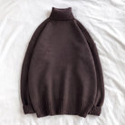 Dark brown oversized turtleneck sweater, knit fabric, laid flat on white background | Chaps London