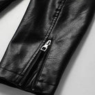 Close-up of black faux leather jacket sleeve with zipper detail | Chaps London