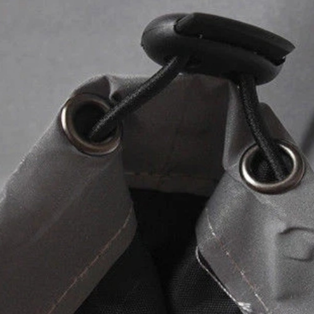 Gray jacket close-up showing metal grommets and black cord toggle detail | Chaps London