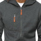 Dark grey zip hoodie with orange zippers, worn by a person | Chaps London