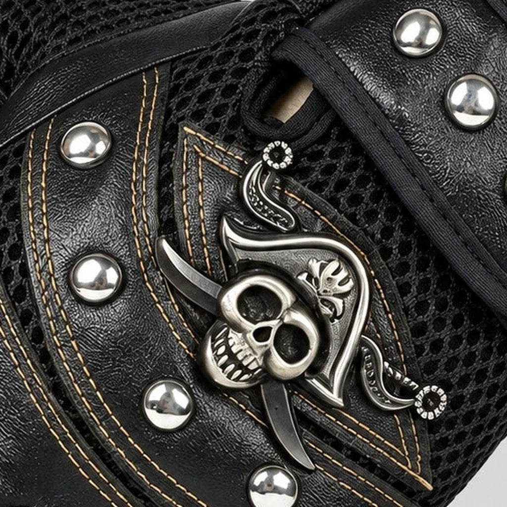 Black faux leather glove detail with silver skull emblem, studs, and stitching | Chaps London