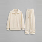 Cream cable-textured collared sweatshirt and wide-leg trousers, laid flat | Chaps London
