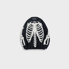 Black knit sweater with white skeleton ribcage pattern, shown flat | Chaps London
