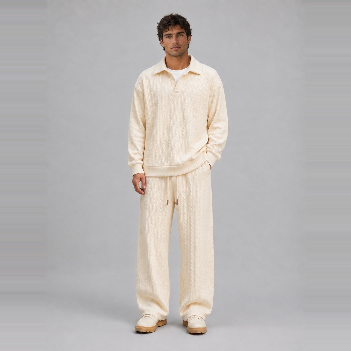 Man wearing cream cable-textured collared top and matching wide-leg trousers | Chaps London