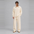 Man wearing cream cable-textured collared top and matching wide-leg trousers | Chaps London